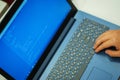 Laptop screen with lines of code. Programmer writes an application in the programming language. Royalty Free Stock Photo