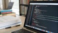 Laptop screen showing programming code with reflection on surface. Stock Photo, Generative AI Royalty Free Stock Photo