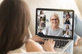 Girl use laptop involved at group videocall with diverse women