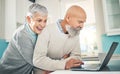 Laptop, senior couple and hug in home, online browsing and social media in house. Computer, retirement and happy man and Royalty Free Stock Photo