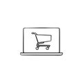 Laptop with shopping cart on screen hand drawn outline doodle icon. Royalty Free Stock Photo