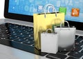 Laptop and shopping pags Royalty Free Stock Photo