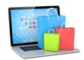 Laptop and shopping pags Royalty Free Stock Photo