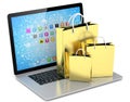 Laptop and shopping pags Royalty Free Stock Photo