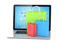 Laptop and shopping pags Royalty Free Stock Photo