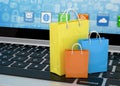 Laptop and shopping pags Royalty Free Stock Photo