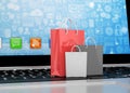 Laptop and shopping pags Royalty Free Stock Photo