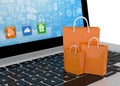 Laptop and shopping pags Royalty Free Stock Photo