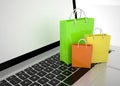 Laptop and shopping pags Royalty Free Stock Photo