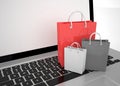 Laptop and shopping pags Royalty Free Stock Photo