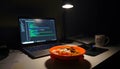 Laptop Showing Code With Bowl Of Noodles And Egg Under Desk Lamp At Night Royalty Free Stock Photo