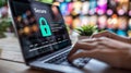 Laptop showing e-commerce checkout with green padlock and \'Secure\'. Customer completing purchase