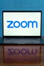 Laptop showing Zoom Cloud Meetings app logo. Royalty Free Stock Photo