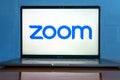 Laptop showing Zoom Cloud Meetings app logo. Royalty Free Stock Photo