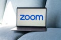 Laptop showing Zoom Cloud Meetings app logo. Royalty Free Stock Photo