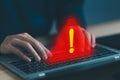 laptop shows a warning sign of system failure. concept notification a spam, risk of website technology digital online. caution Royalty Free Stock Photo