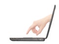 The laptop a side view.Female hand. Royalty Free Stock Photo