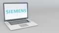 Laptop with Siemens logo. Computer technology conceptual editorial 3D rendering Royalty Free Stock Photo