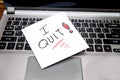 Laptop with sign laying on it, I quit! Royalty Free Stock Photo