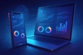Laptop and smartphone displaying data analytics with colorful charts and graphs computer mobile phone Royalty Free Stock Photo