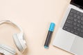 Laptop and stationery on beige workspace, top view with copy space Royalty Free Stock Photo
