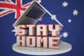 Laptop and STAY HOME text on the Australian flag background. Coronavirus self-isolation in Australia, 3D rendering