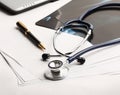 Laptop ,stethoscope and x-ray on the table Royalty Free Stock Photo