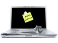 Laptop with sticky note and tool Royalty Free Stock Photo