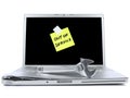 Laptop with sticky note and tool Royalty Free Stock Photo