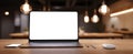 The laptop on a stylish desk in a contemporary workspace with ambient lighting. AI generated image Royalty Free Stock Photo