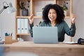 Laptop, success and business woman in celebration at her desk in modern corporate office. Happy, celebrate and Royalty Free Stock Photo