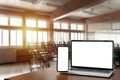 Laptop on table foreground. High school. View of the interior of elementary school. During the semester break, there were no