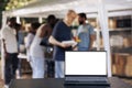 Laptop on table with white screen