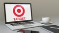 Laptop with Target Corporation logo on the screen. Modern workplace conceptual editorial 3D rendering