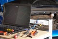 Laptop and tools for car diagnostic Royalty Free Stock Photo