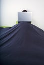 Laptop on top bedcover mountain Royalty Free Stock Photo