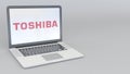 Laptop with Toshiba Corporation logo. Computer technology conceptual editorial 3D rendering