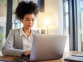 Laptop, typing and serious business woman reading emails at desk. Formal, professional and worker with focus and Royalty Free Stock Photo