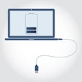 Laptop with USB cable Royalty Free Stock Photo