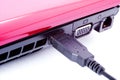 Laptop with USB cable inserted