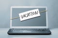 Laptop with vacation note Royalty Free Stock Photo