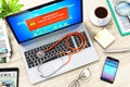 Laptop with virus attack warning message on screen and stethoscope Royalty Free Stock Photo