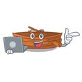 With laptop wooden boat in the cartoon shape