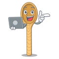 With laptop wooden spoon character cartoon