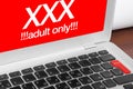 Laptop with XXX message
