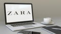 Laptop with Zara logo on the screen. Modern workplace conceptual editorial 3D rendering