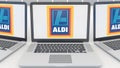 Laptops with Aldi logo on the screen. Computer technology conceptual editorial 3D rendering Royalty Free Stock Photo