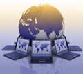 Laptops around a globe Royalty Free Stock Photo