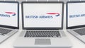 Laptops with British Airways logo on the screen. Computer technology conceptual editorial 3D rendering