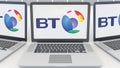 Laptops with BT Group logo on the screen. Computer technology conceptual editorial 3D rendering